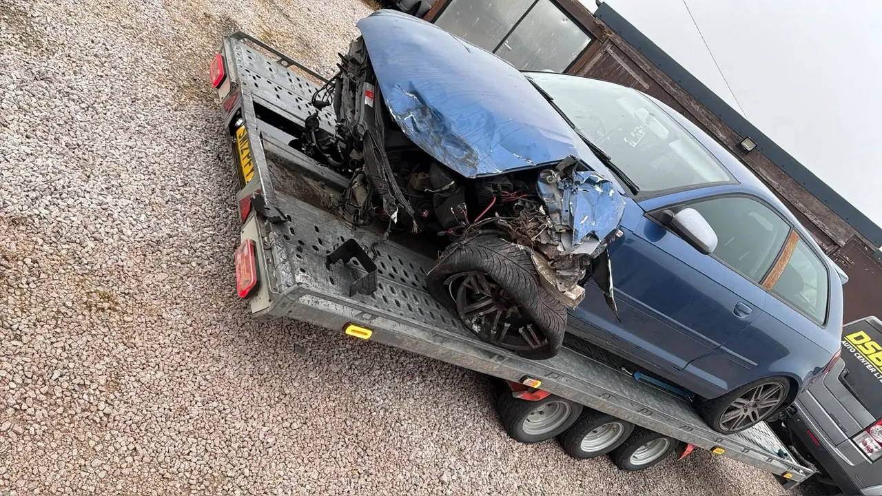 DSBM accident damaged blue car recovery