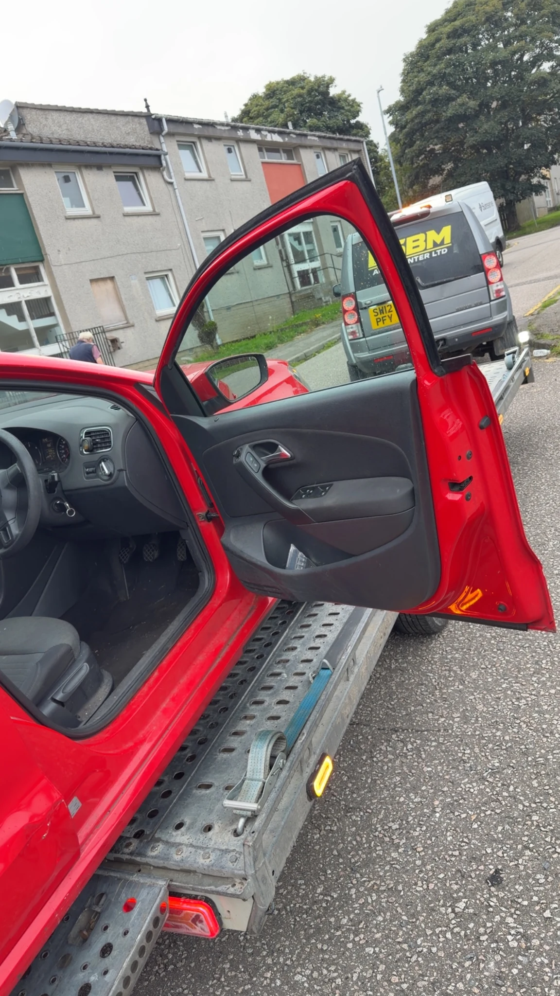 Red hatch being loaded onto the DSBM trailer